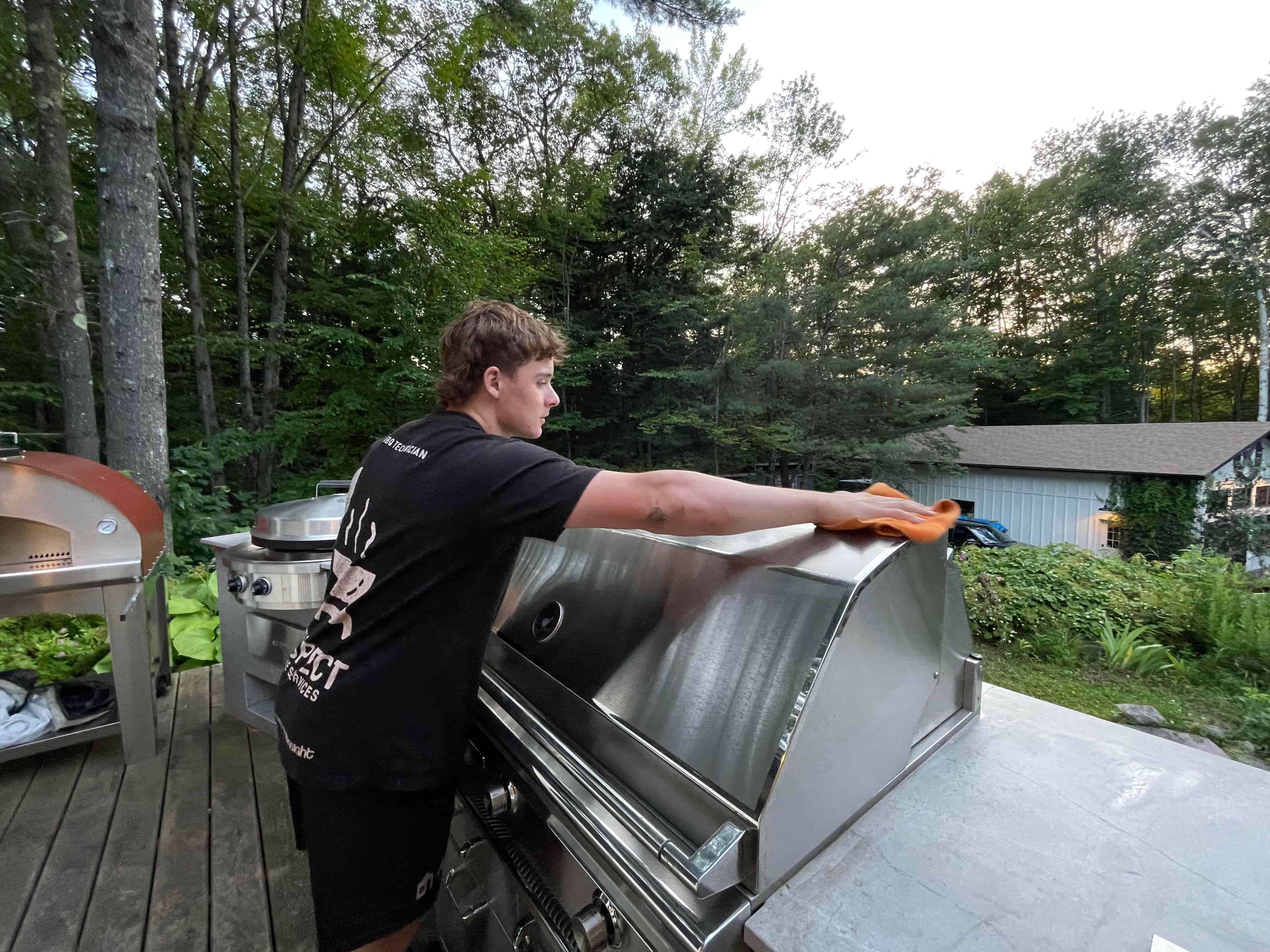 Aspect technician detailing a built-in grill
